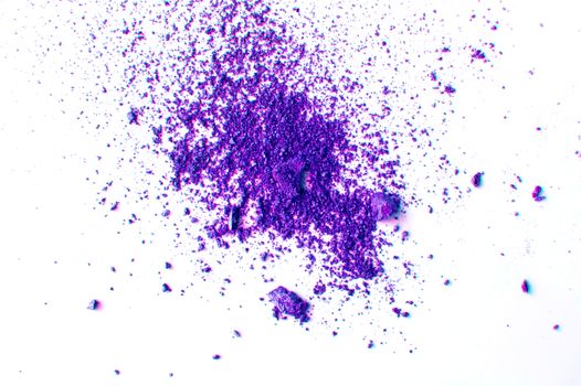 Lilac or purple eyeshadow, scattered crumbs isolated on white background, beauty and makeup concept.