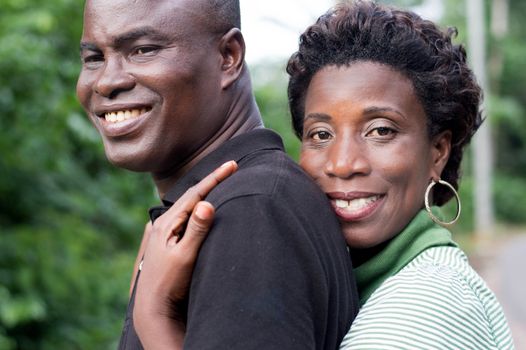 portrait of happy young couple in love in the countryside.