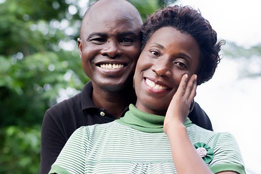 portrait of happy young couple in love in the countryside.