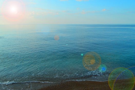 Calm sea ocean and blue sky background, sunrise over the sea, beautiful background.