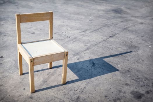 Small Wooden Chair in the Sunlight