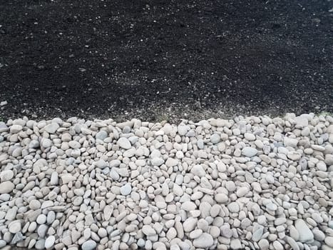 white and grey stones or rocks with brown dirt or soil