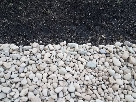 white and grey stones or rocks with brown dirt or soil