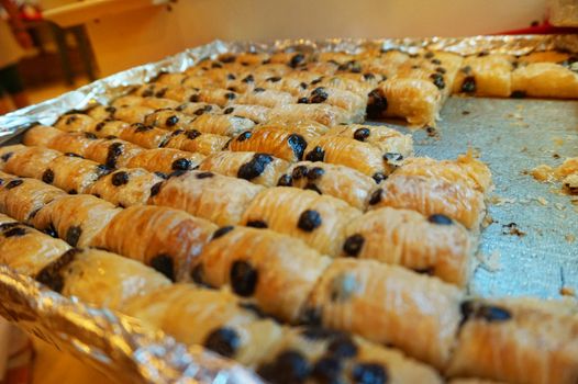 Traditional Arabic dessert-baklava, the concept of celebrating the Holy month of Ramadan and Eid al-Fitr, food background, sweet food.