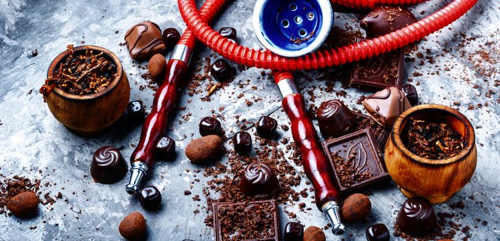 Oriental smoking hookah with a taste of chocolates. Chocolate tobacco flavor.