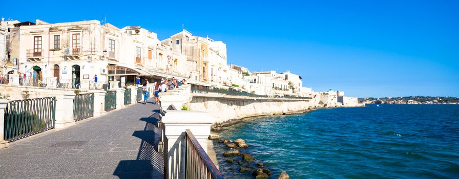 SYRACUSE, ITALY - MAY 18, 2018: view of Ortigia area, downtown of Syracuse, Sicily, at the beginning of  summer season