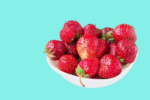 fresh ripe strawberries on a tablecloth, place for your text.