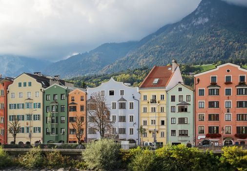 colorful houses on the waterfront of the River Inn in Innsbruck, Austria