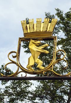 Signboard on the house in the form of the coat of arms of Berlin