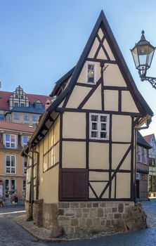 the street with half-timbered houses in Quedlinburg, Germany. In downtown a wide selection of half-timbered buildings from at least five different centuries are to be found