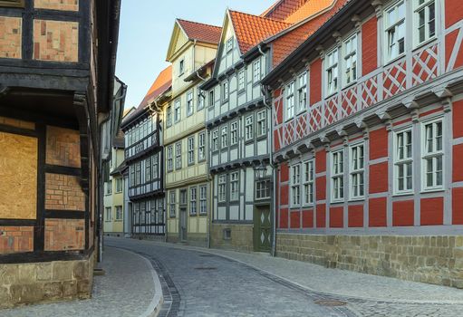 the street with half-timbered houses in Quedlinburg, Germany. In downtown a wide selection of half-timbered buildings from at least five different centuries are to be found