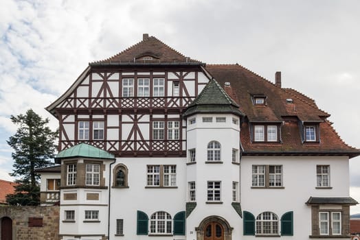 the street with picturesque ancient half-timbered houses in the Fritzlar city, Germany