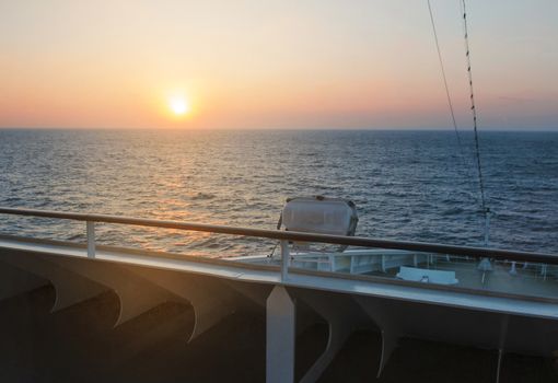 Beautiful view from the deck of the cruise ship at sunrise and the Mediterranean sea.