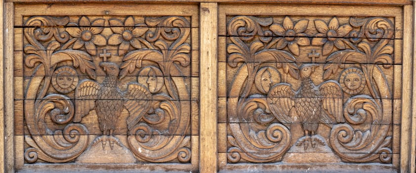 Close up of wooden panel decoration in northern Romania.