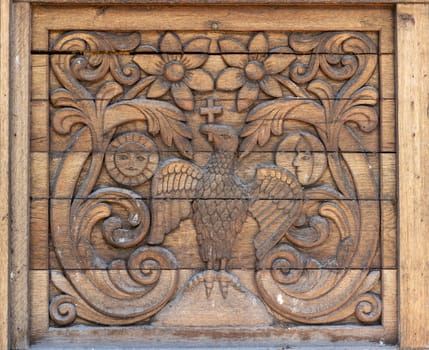 Close up of wooden panel decoration in northern Romania.