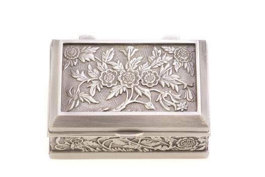 Top view of stylish jewelry silver box isolated on white.