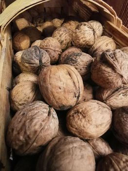 walnuts in a basket - close up photo of healthy food