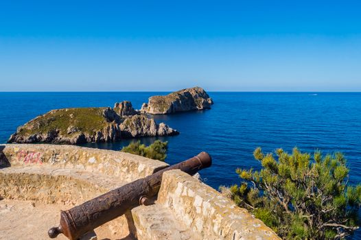 Old cannon cannon overhang the marine reserve of the Malgrats Islands northwest of the island of Palma de Mallorca