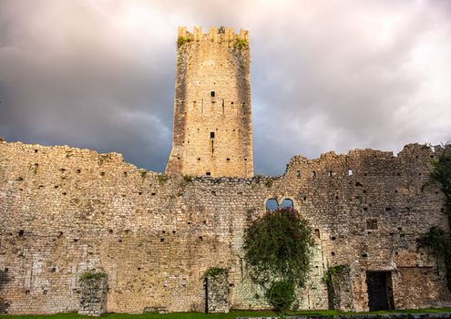 castle and tower of ninfa ruins in Lazio - Latina province - Italy .