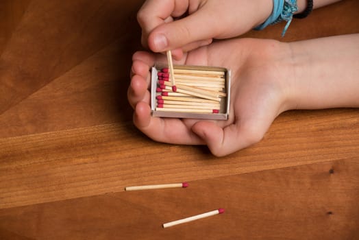 Child playing with matches.