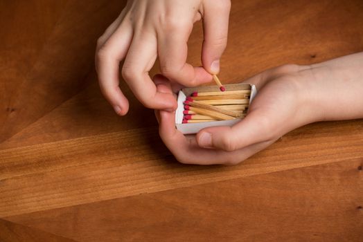 Child playing with matches.