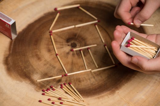 Child playing with matches.