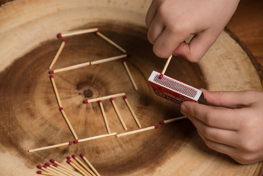 Child playing with matches.