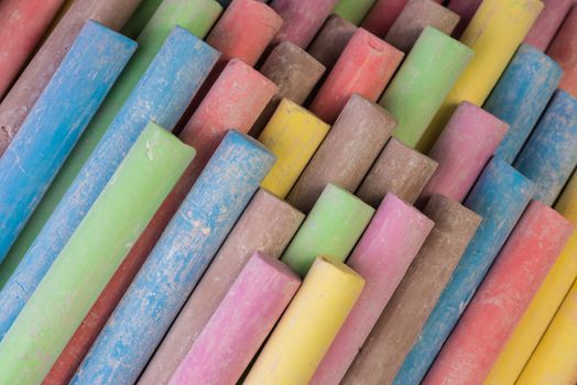 Set of dustless colored chalk background.