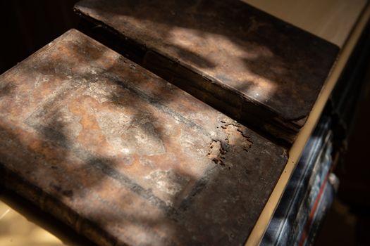 Close up of old Christian manuscripts on church pulpit.