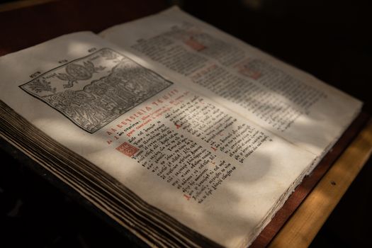 Old Christian manuscript written in Cyrillic on church pulpit.