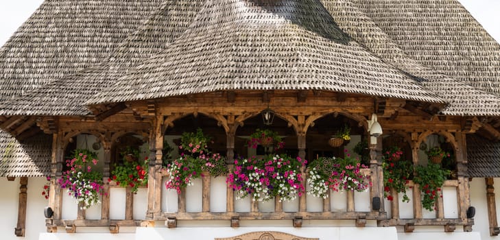 Barsana Monastery Architectural Detail - Museum Balcony Flowers (Maramures, Romania).