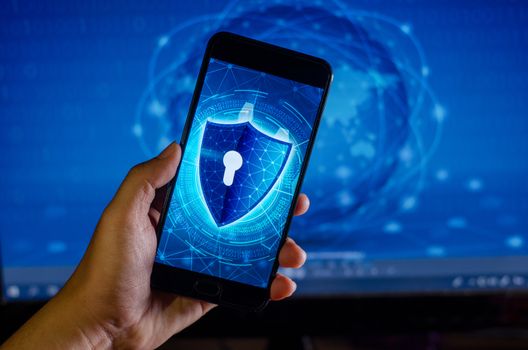 Shield Internet phone Smartphone is protected from hacker attacks, Firewall Businesspeople press the protected phone on the internet. space put message