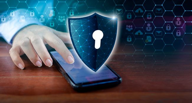 Shield Internet phone Smartphone is protected from hacker attacks, Firewall Businesspeople press the protected phone on the internet. space put message