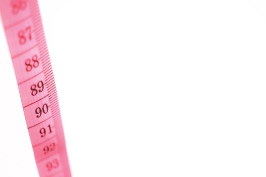 Pink Tape Measure on a white background