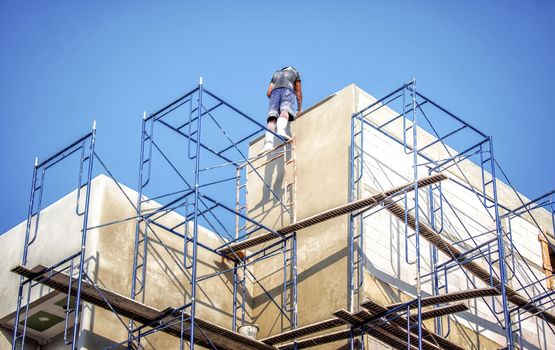 Apartment Building being Constructed with No Safety Equipment for Workers