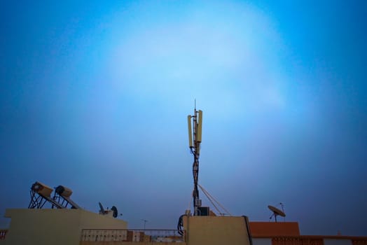 mobile telecommunications antenna on a roof