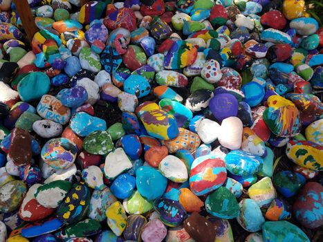 bright blue colored or painted stones or rocks