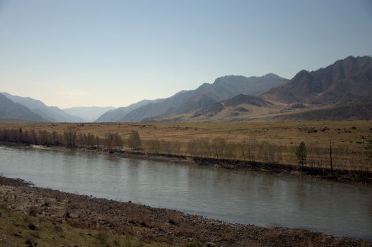 The swift Katun River carries its turquoise waters through the Altai Mountains.