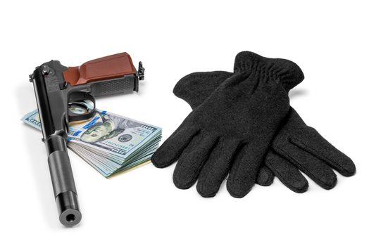 gun with a silencer, money and gloves closeup concept of robbery