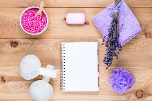 lavender theme: a clean sheet of notepad and objects with lavender for spa and relaxation