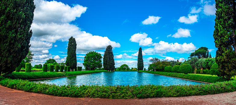 The wide Pecile pool and vast pond of Villa Adriana or Hadrian s Villa archaeological site in Tivoli - Rome province- Lazio region- Italy .