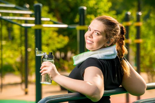 girl over size after workout resting, work on your body concept photo