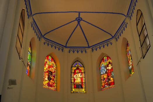 roof and stained glasses of choir of church Saint Francis Xavier in Melaka Malaysia  modeled after Cathedral of Saint Peter in Montpellier France