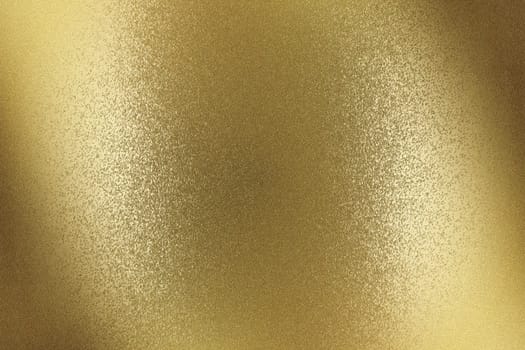 Glowing brushed bronze metal wall surface, abstract texture background