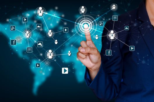 Communication technology network world map businessman pressing modern social buttons on a virtual background