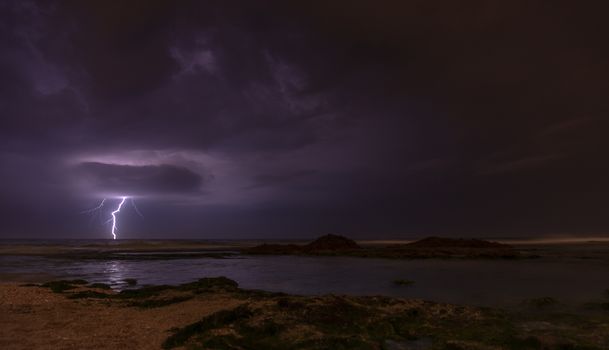 Lightning, heavy clouds and rain stormy weather