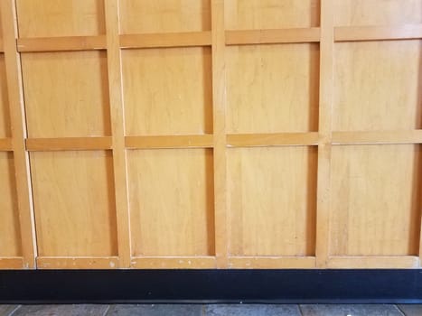 floor tiles and brown wood cabinet or furniture