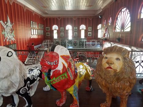 brightly colored or painted lion statues in Ponce, Puerto Rico