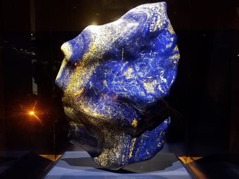 large blue and gold rock or boulder or stone or gem or mineral