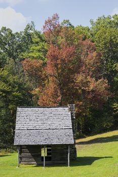 Front view of the Preacher Jesse Brown's historic cabin located in E. B. Jeffress Park along the Blue Ridge Parkway in Ashe County, North Carolina.